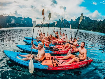 Group kayaking in Khao Sok Thailand with picturesque scenes 